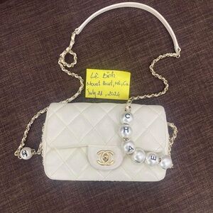 Chanel pearl on chain - 18cm - 4000 Cad